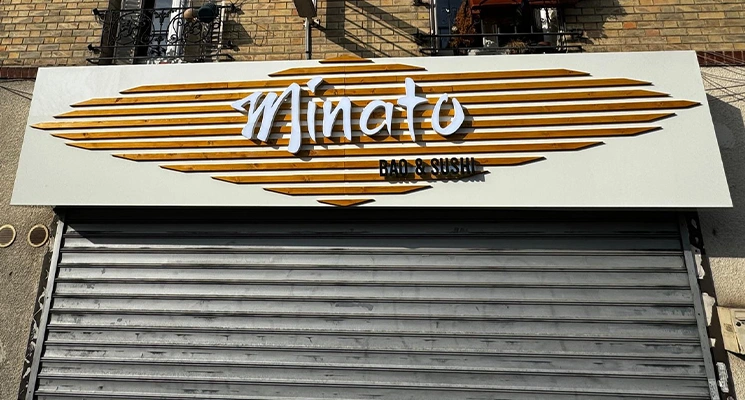 pose enseigne lumineuse magasin facade commerciale installation professionnelle