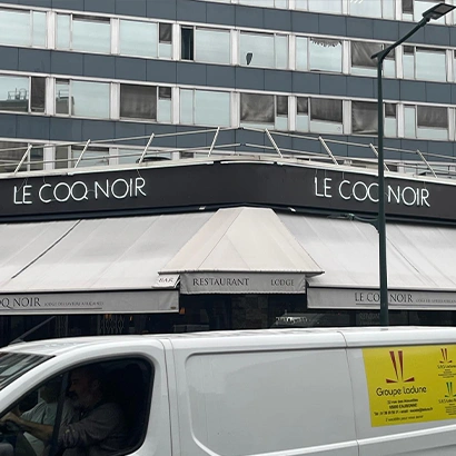 store banne Le Coq Noir installation professionnelle