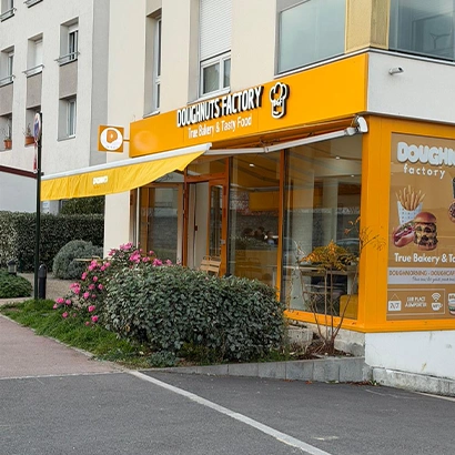 pose store banne jaune Doughnuts Factory boutique Paris